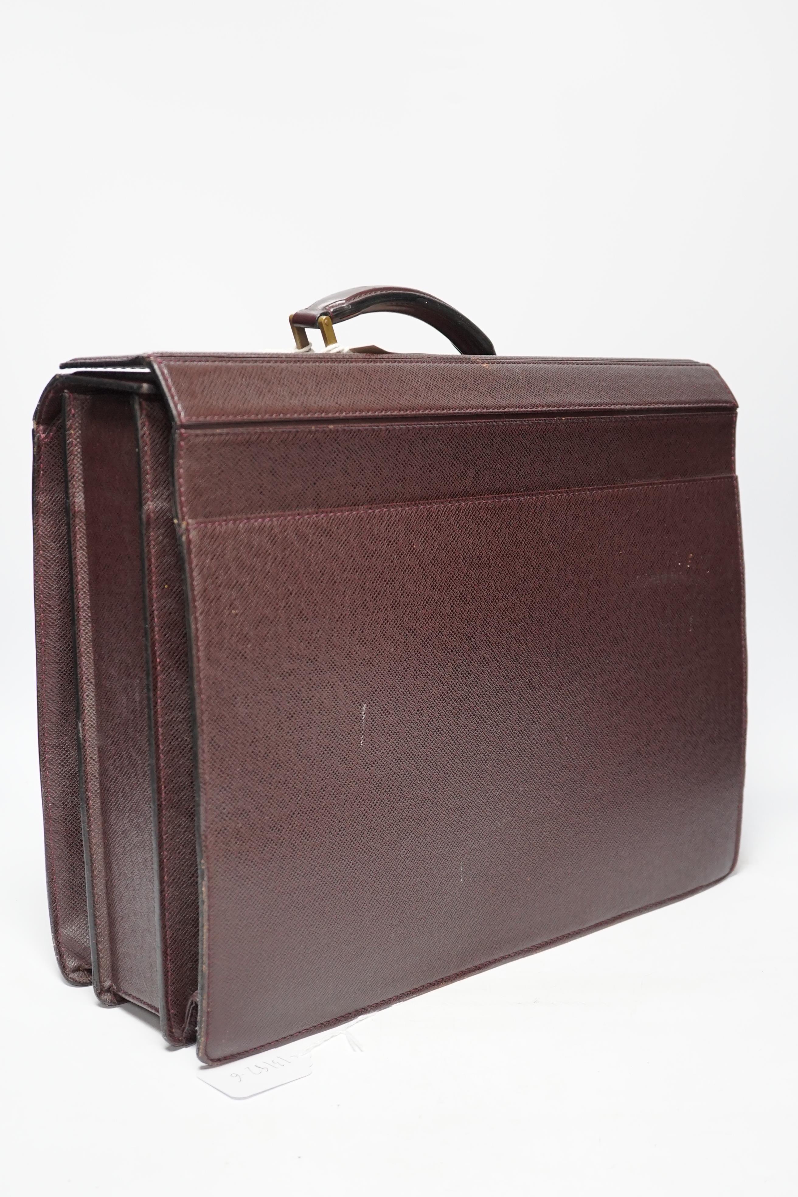 A Louis Vuitton brown leather briefcase, locked and marked, 42cm wide
